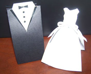 homemade wedding favor boxes in shape of tux and wedding dress
